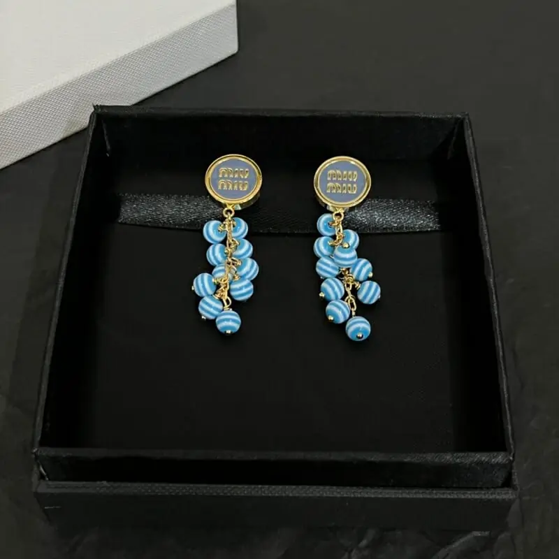 miu miu boucles doreilles pour femme s_12240534